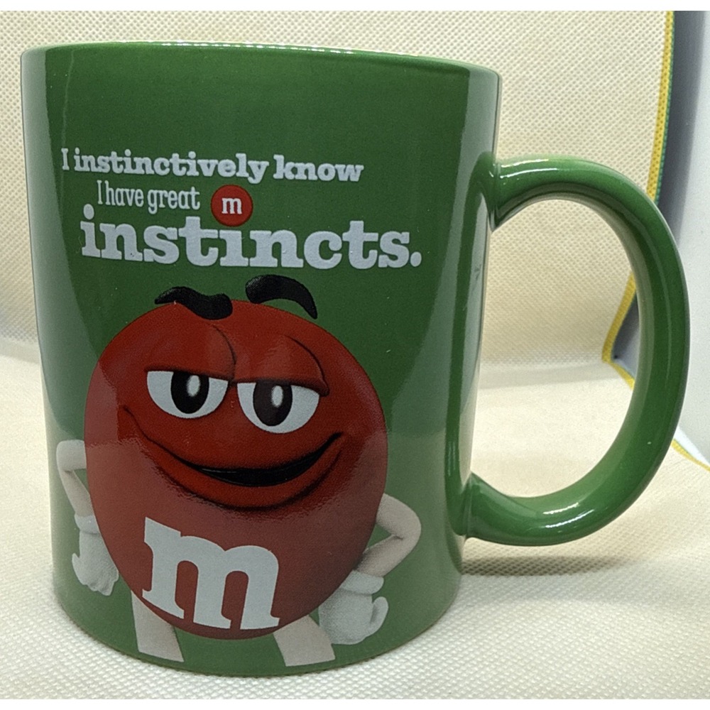 Green M&M’s Coffee Cup with the Red M&M - I instinctively know great instincts